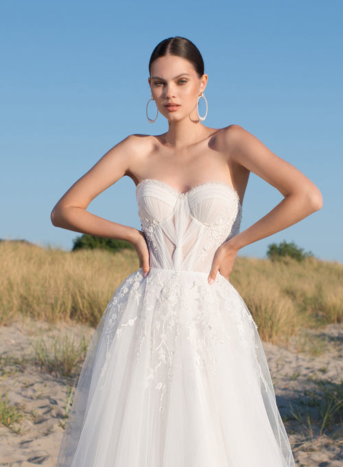 Robe de mariée trapèze en tulle avec boléro