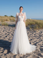 Robe de mariée trapèze en tulle avec boléro