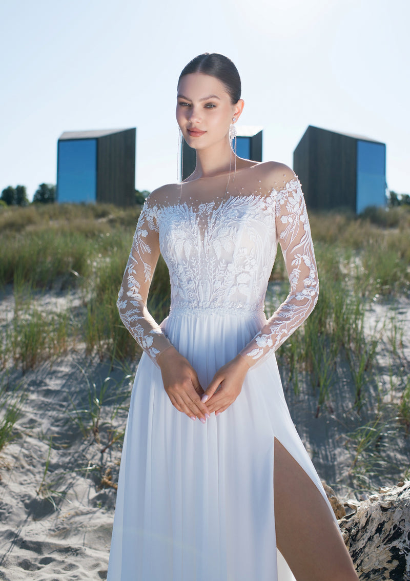 Robe de mariée trapèze à manches longues en dentelle transparente et à épaules dénudées avec fente