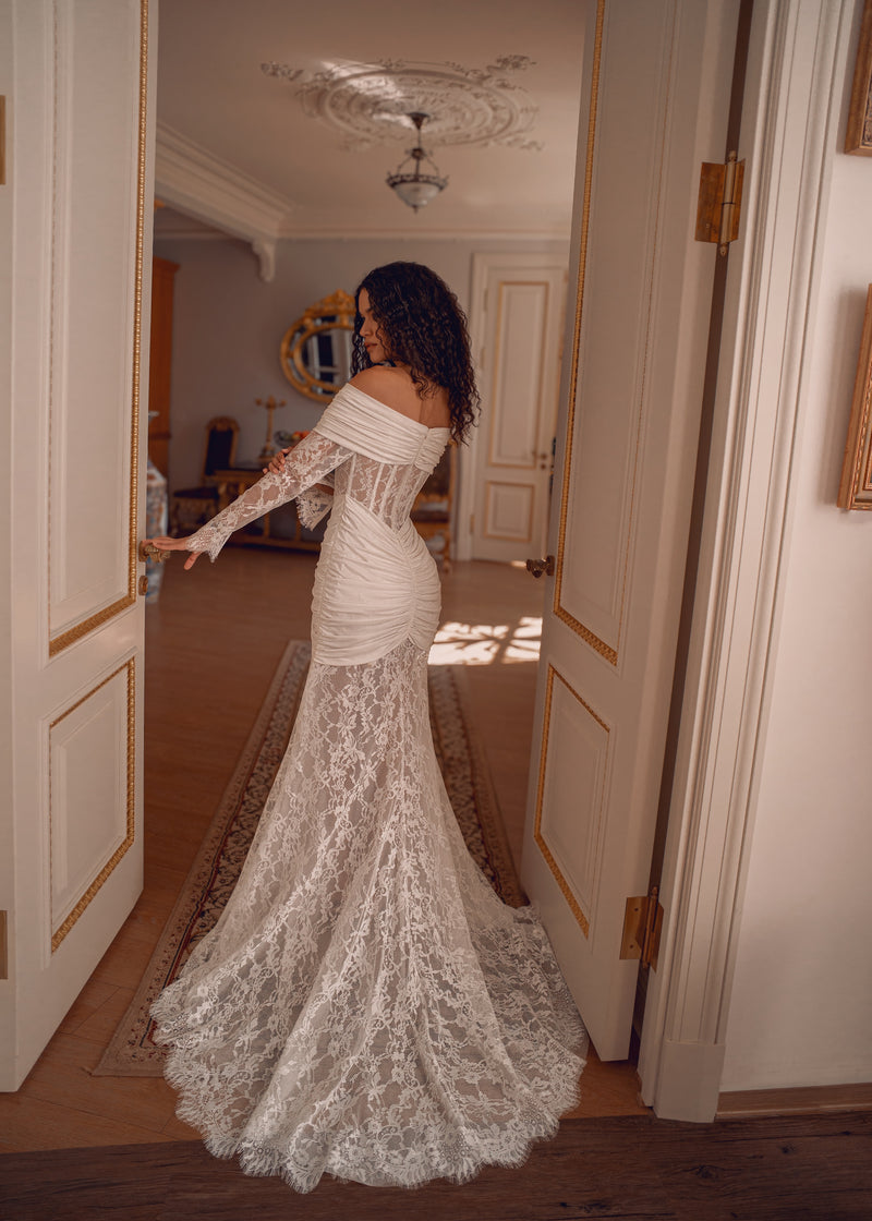 Off-Shoulder Lace Corset Wedding Dress with Draped Knit Details Off-Shoulder Lace Corset Wedding Dress with Draped Knit Details