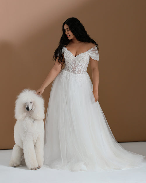 Robe de mariée romantique à épaules dénudées et coupe trapèze avec corsage en dentelle
