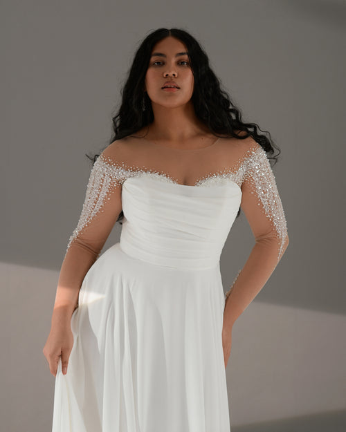Robe de mariée trapèze à manches longues et corsage en cœur Illusion