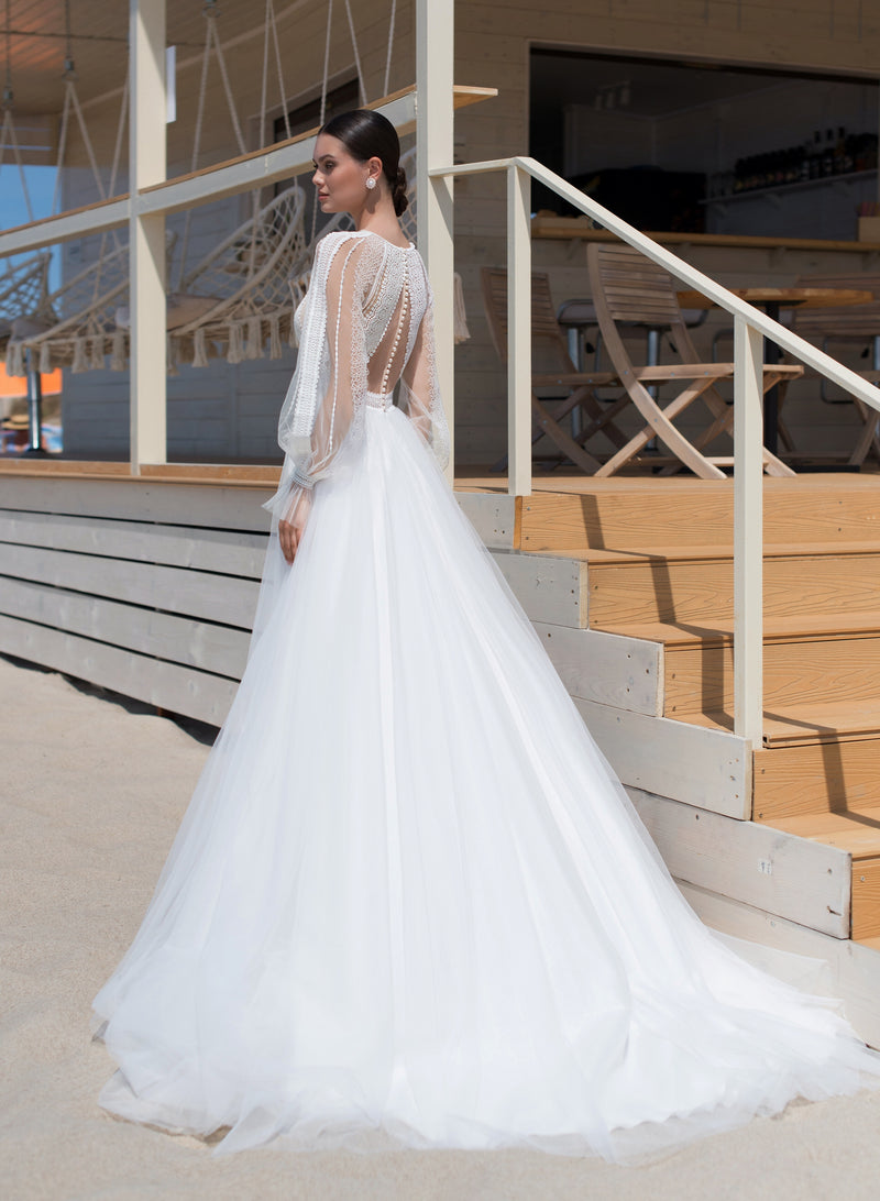 Elegante vestido de novia de encaje de manga larga y línea A