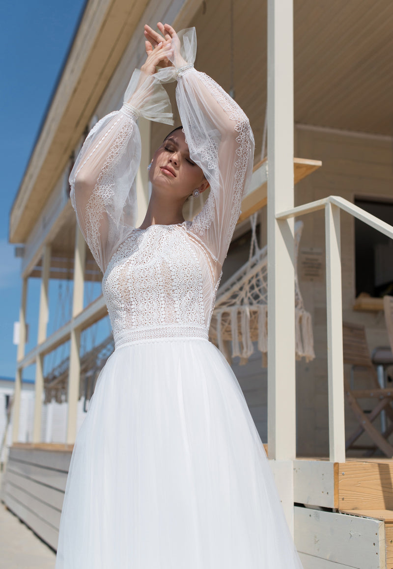 Elegante vestido de novia de encaje de manga larga y línea A