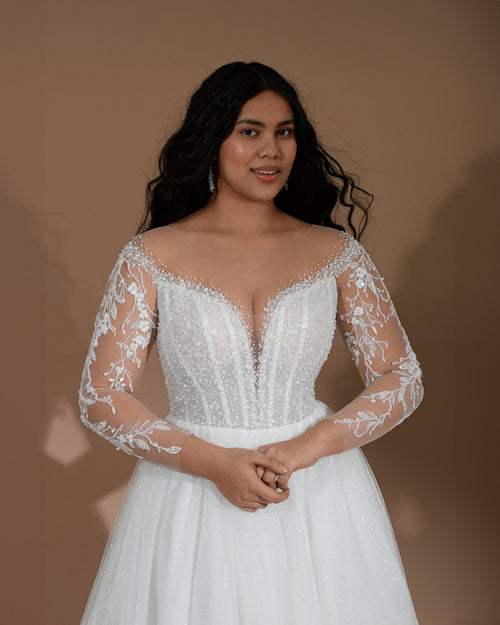 Robe de mariée trapèze en tulle pailleté à manches longues et dentelle transparente 