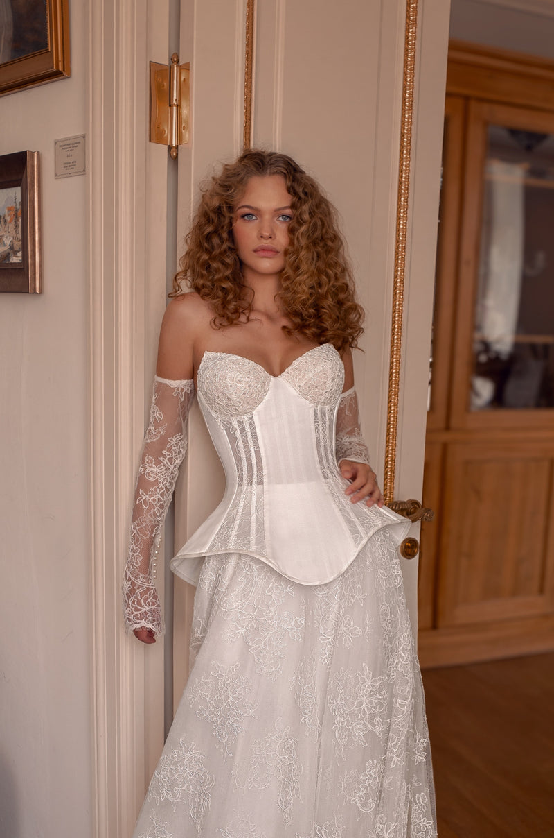 Lace Corset Ball Gown with Peplum Detail and Sheer Gloves