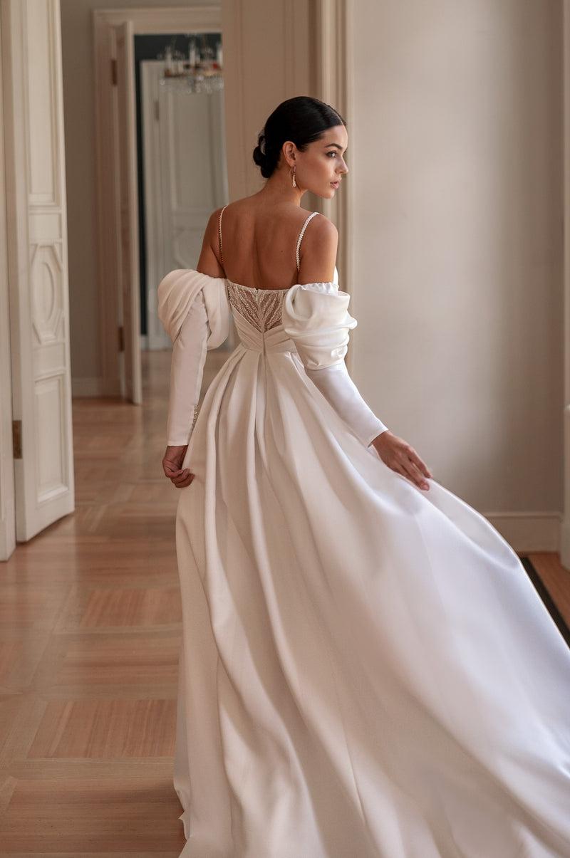Minimalistic A-Line Spaghetti Strap Gown with Removable Sleeves – HAREM's Brides Minimalistic A-Line Spaghetti Strap Gown with Removable Sleeves – HAREM's Brides