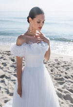 Vestido de novia único con hombros descubiertos y corte A