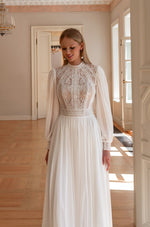 Vestido de novia bohemio modesto con escote alto, manga larga, corte A y espalda abierta