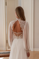 Vestido de novia bohemio modesto con escote alto, manga larga, corte A y espalda abierta