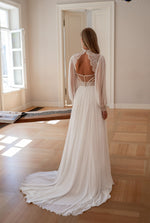 Vestido de novia bohemio modesto con escote alto, manga larga, corte A y espalda abierta