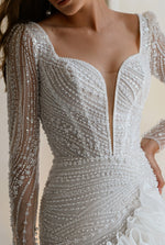 Exquisite Beauty: Long Sleeve Sparkle Mini Bridal Dress with Unique Skirt Details