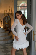 Exquisite Beauty: Long Sleeve Sparkle Mini Bridal Dress with Unique Skirt Details
