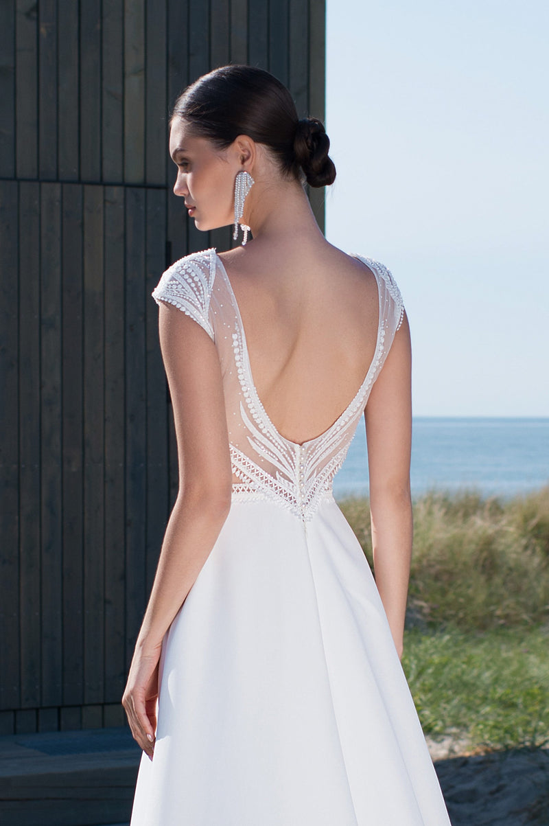 Minimalist V-Neck Cap Sleeve Wedding Dress with a Slit HAREM's Brides Minimalist V-Neck Cap Sleeve Wedding Dress with a Slit HAREM's Brides