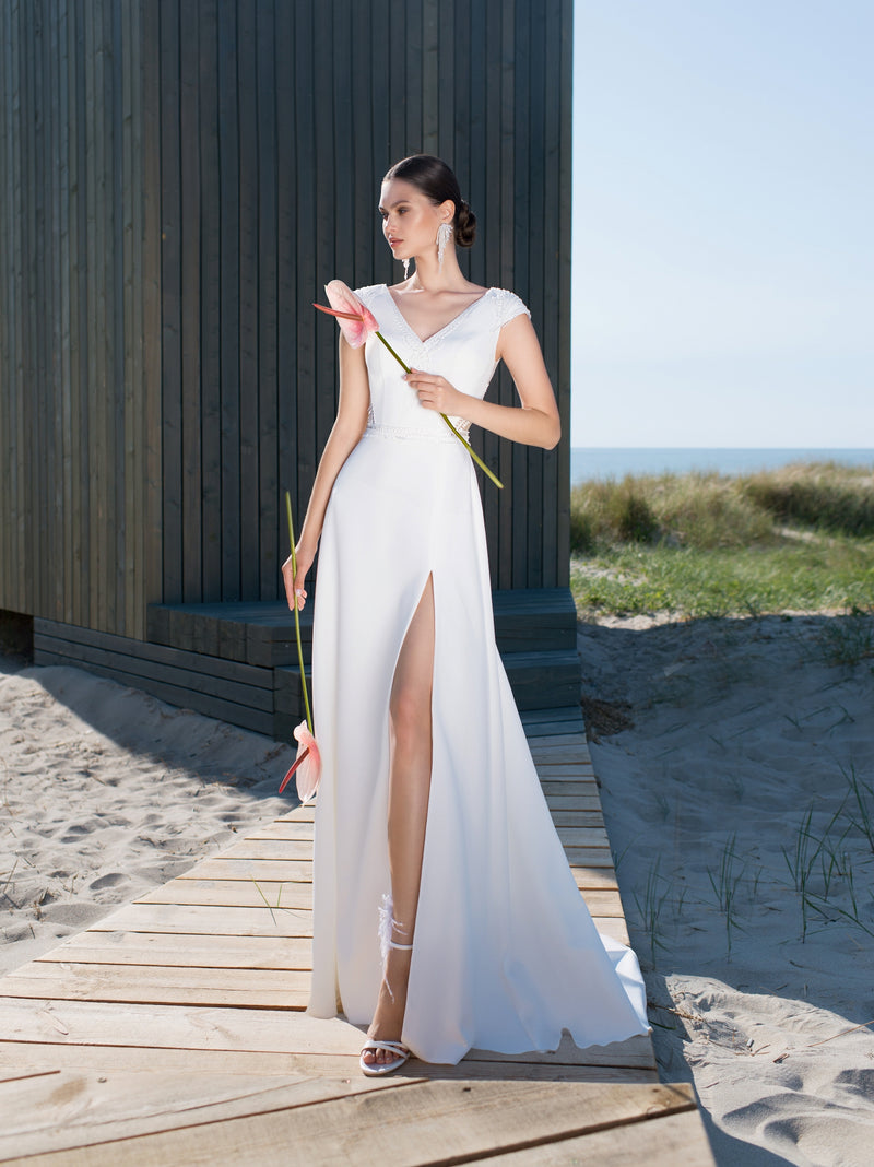 Minimalist V-Neck Cap Sleeve Wedding Dress with a Slit HAREM's Brides Minimalist V-Neck Cap Sleeve Wedding Dress with a Slit HAREM's Brides