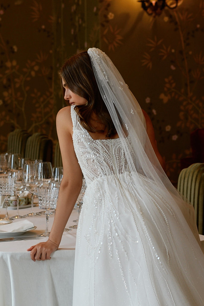 Chic A-Line Strapped Glitter Wedding Gown with Long Train