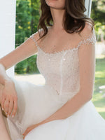 Robe de mariée princesse romantique à épaules dénudées et décolleté transparent