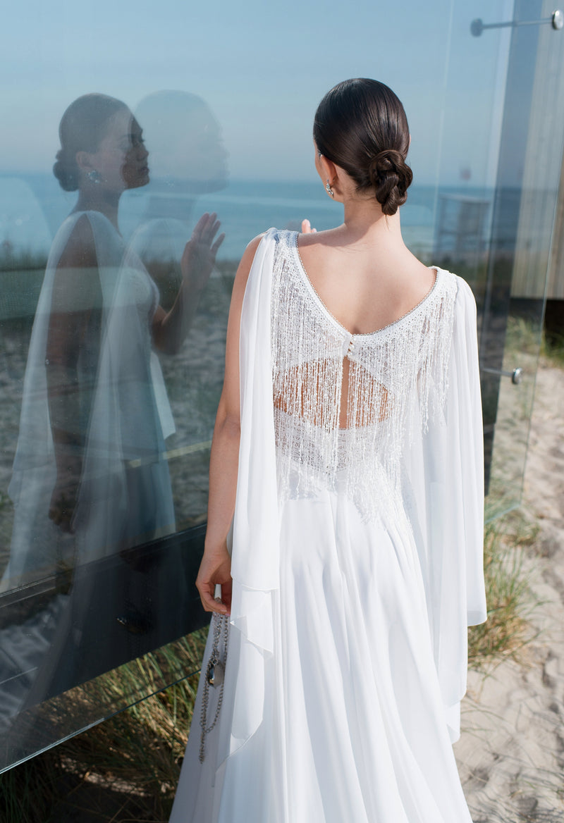 Vestido de novia sin mangas con cuello en V y espalda única y exquisita