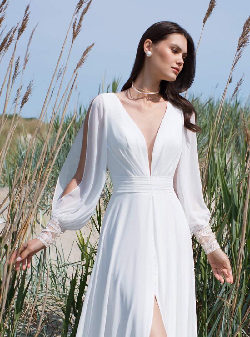 Long Sleeve Wedding Dress with a Front Slit and Back Details HAREM's Brides Long Sleeve Wedding Dress with a Front Slit and Back Details HAREM's Brides