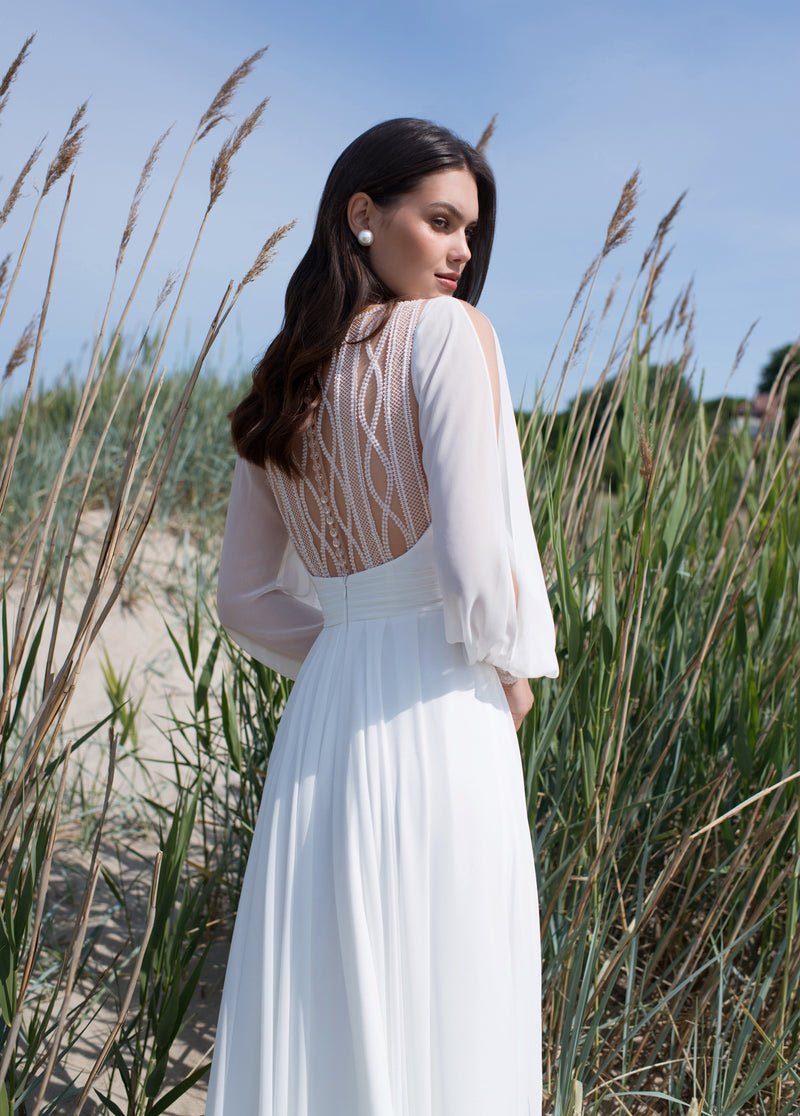 Long Sleeve Wedding Dress with a Front Slit and Back Details HAREM's Brides Long Sleeve Wedding Dress with a Front Slit and Back Details HAREM's Brides