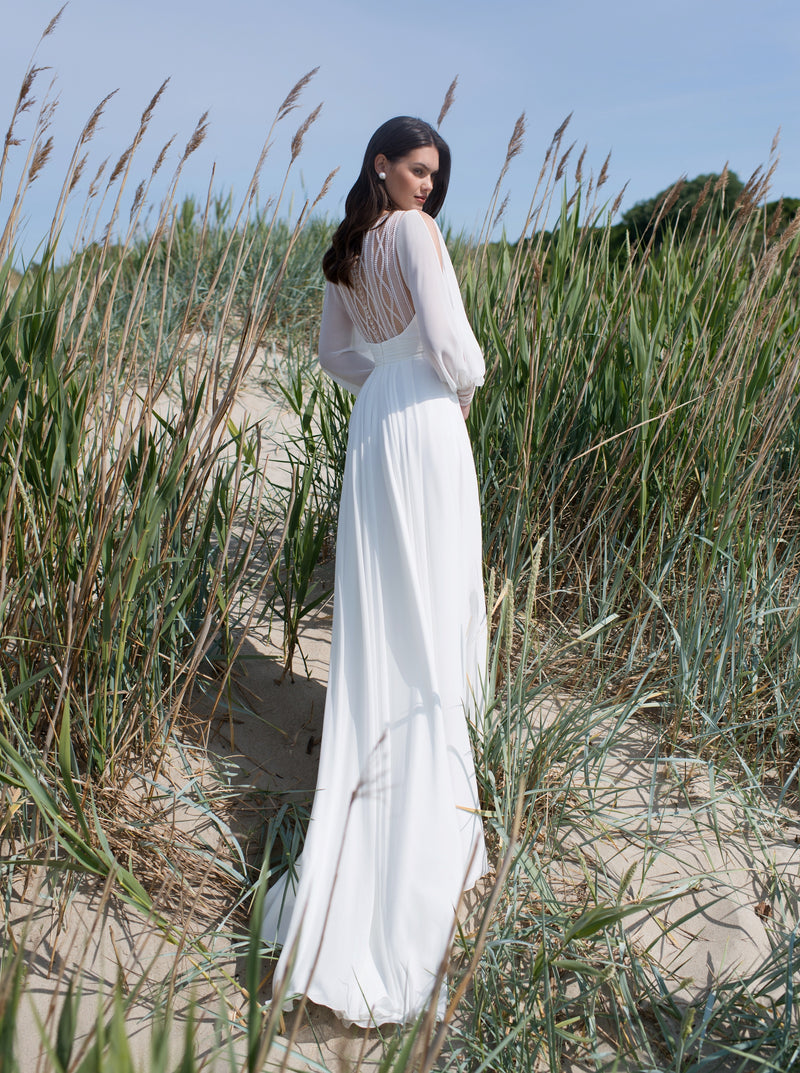 Long Sleeve Wedding Dress with a Front Slit and Back Details