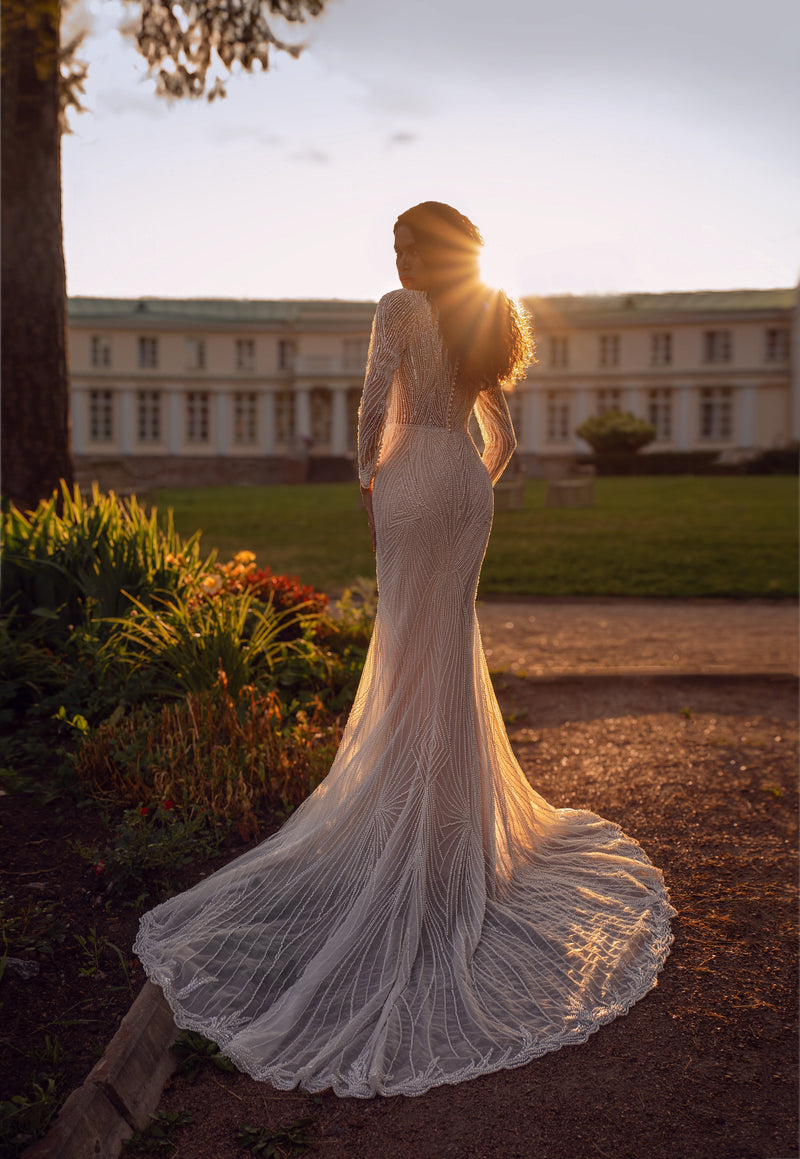 ✨ Long-Sleeve Beaded Illusion Wedding Dress with High Neck