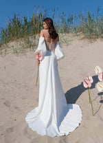 Vestido de novia minimalista sin tirantes con mangas extraíbles