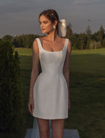 Impresionante mini vestido blanco