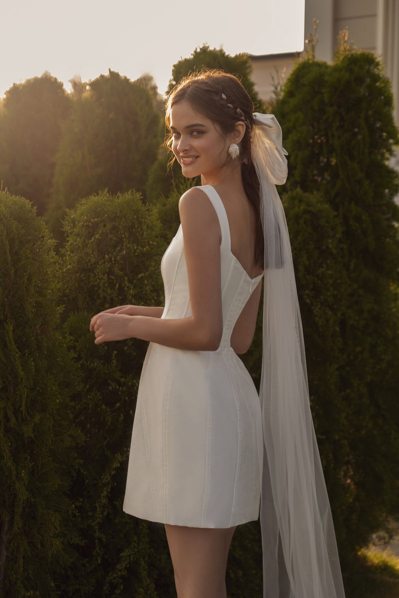 Impresionante mini vestido blanco