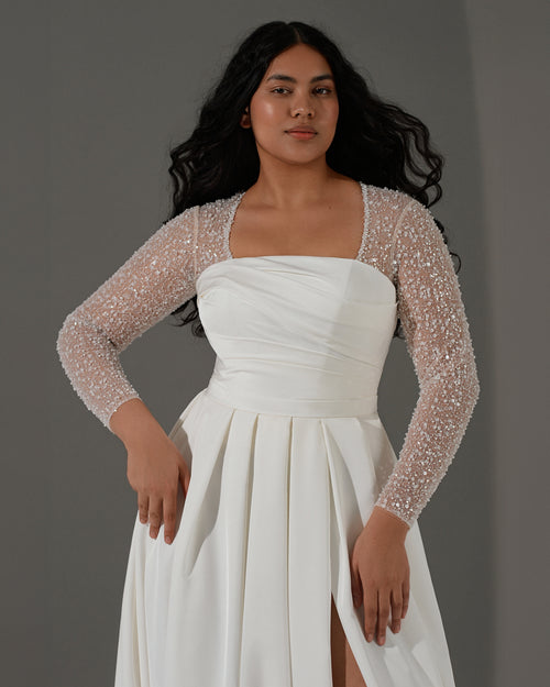 Robe de mariée mikado à manches longues et coupe trapèze avec fente latérale 