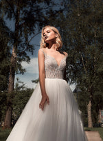 Robe de mariée princesse romantique avec des ailes angéliques