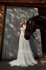 Vestido de novia bohemio sin tirantes con mangas removibles