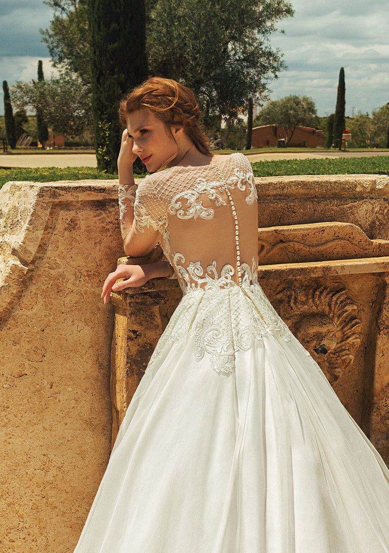 Vestido de novia evasé de manga larga transparente