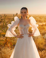 Robe de mariée corset avec boléro à manches longues