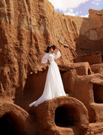 Robe de mariée modeste élégante à manches longues et col haut