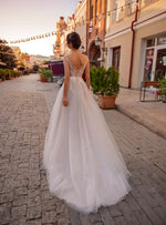 Robe de mariée pailletée à manches courtes