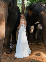 Robe de mariée trapèze à bretelles spaghetti