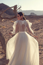 Vestido de novia de manga larga con lunares