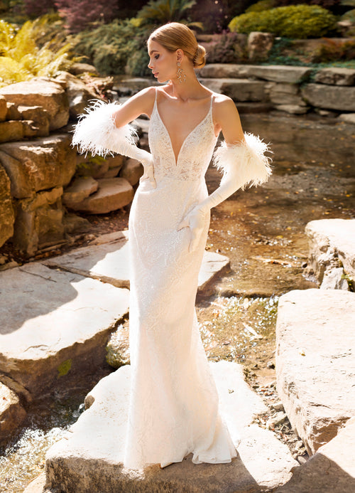 Superbe robe de mariée à bretelles spaghetti avec un boléro unique