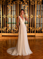 Robe de mariée pailletée sans manches à col en V