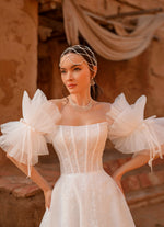 Robe de mariée bustier avec manches bouffantes amovibles