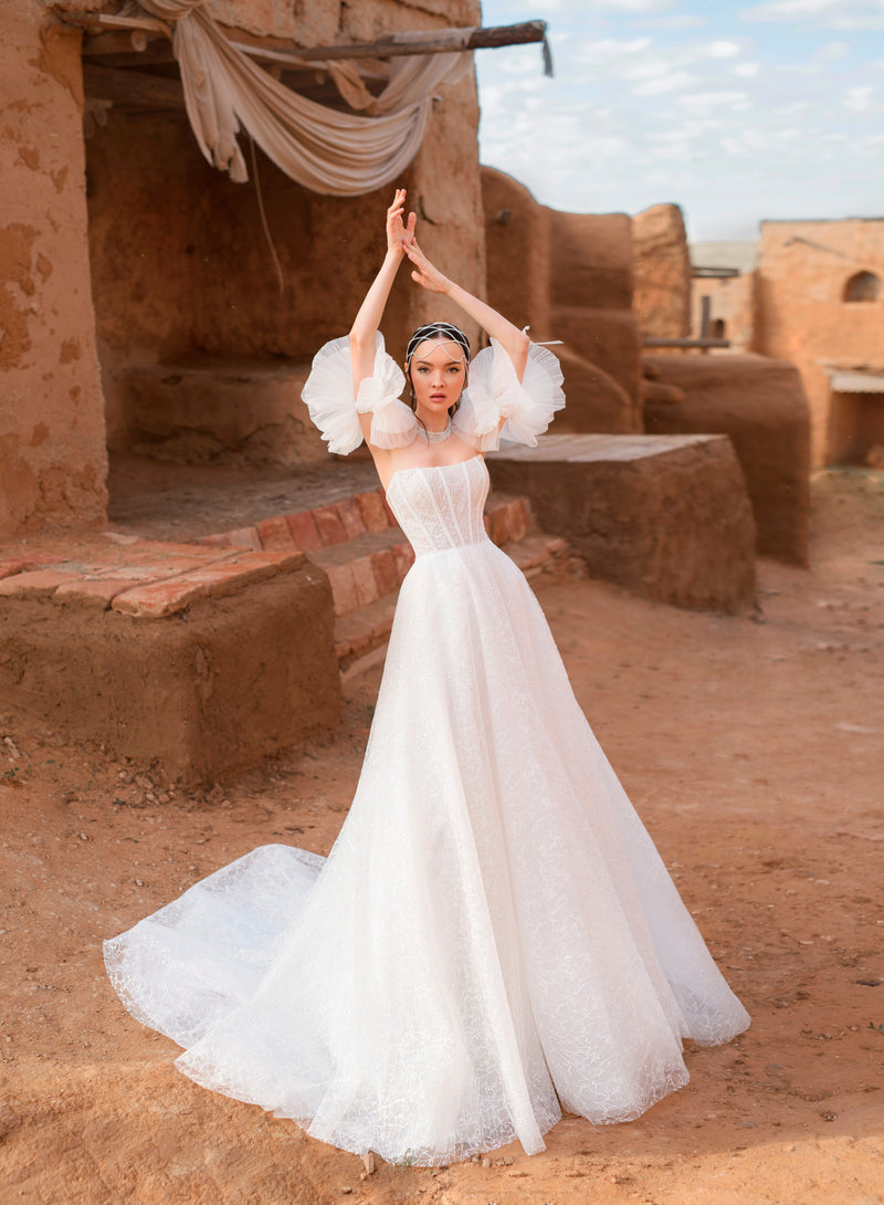 Robe de mariée bustier avec manches bouffantes amovibles