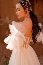 Robe de mariée bustier avec manches bouffantes amovibles