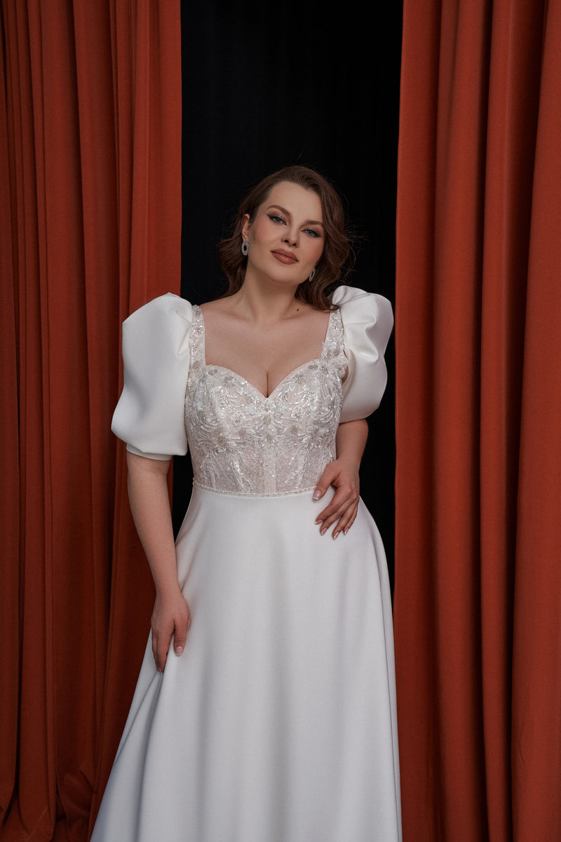 Robe de mariée trapèze à manches bouffantes