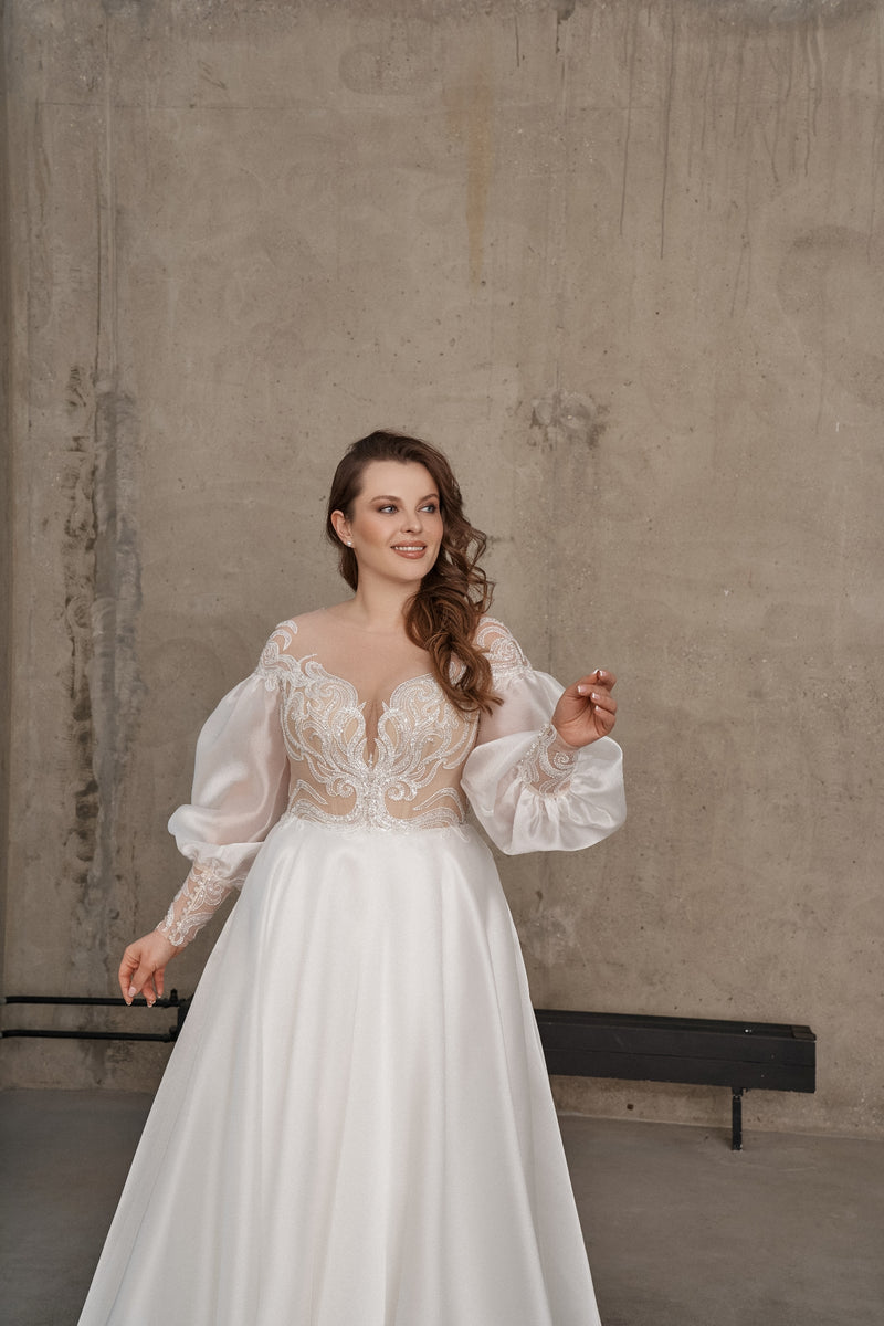 Vestido de novia de corte A con mangas abullonadas