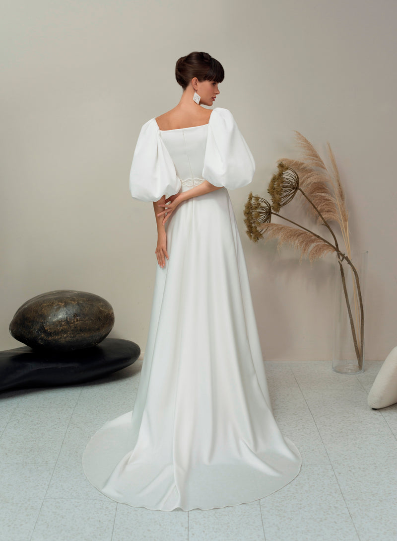Robe de mariée trapèze minimaliste élégante avec manches bouffantes