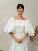 Elegante vestido de novia minimalista de corte A con mangas abullonadas