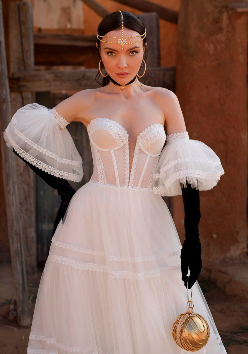 Robe de mariée bustier avec manches bouffantes amovibles