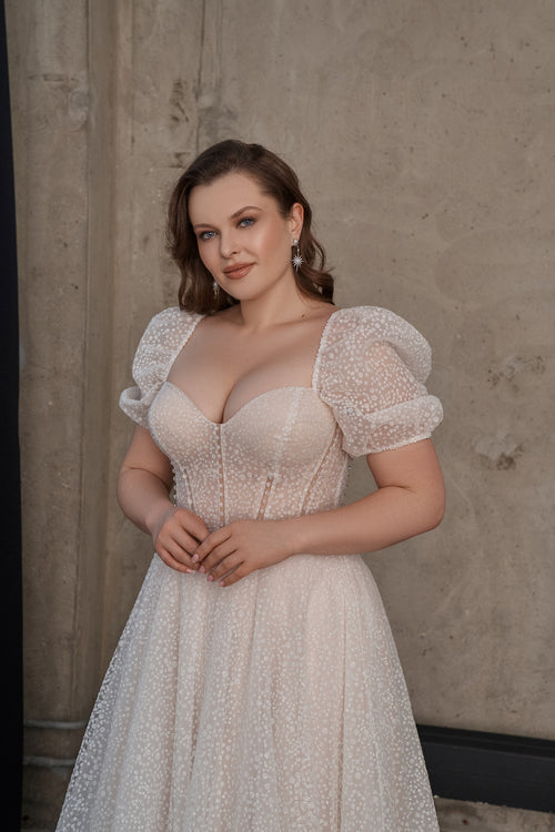 Vestido de novia evasé brillante con mangas casquillo