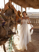 Vestido de novia bohemio con tirantes y mangas desmontables